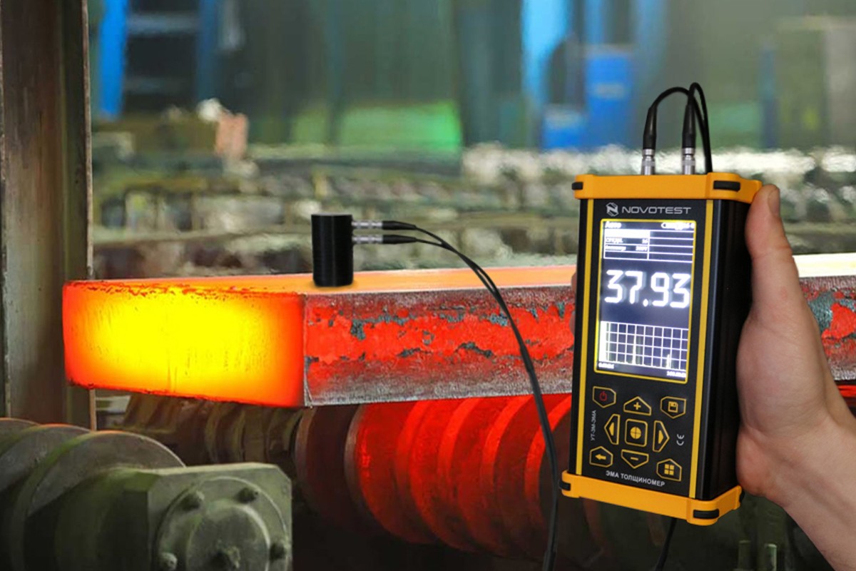 NOVOTEST UT-3M-EMA dengan high-temperature probe pada komponen logam panas